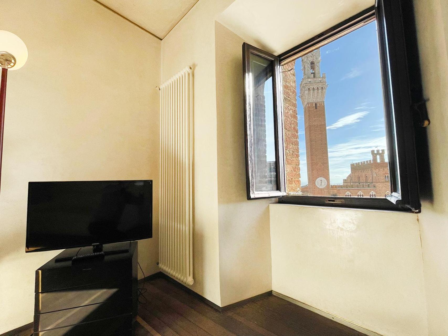 Il Campo 8: Piazza Del Campo Apartment Сиена Екстериор снимка